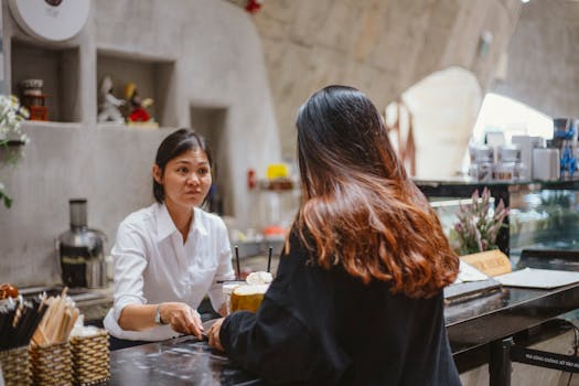 busy restaurant with customers ordering online