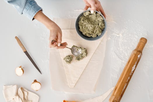 chefs preparing food in the kitchen