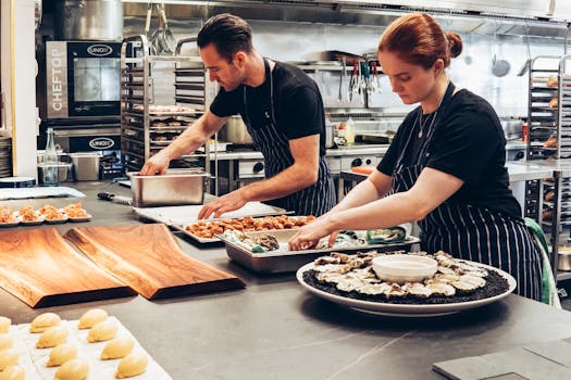 restaurant kitchen with chefs cooking