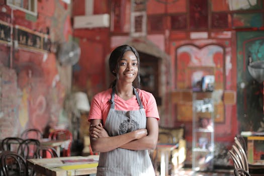 image of a restaurant staff member talking to a customer