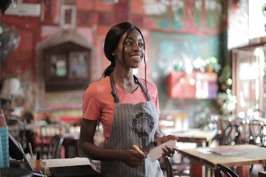 happy restaurant staff serving customers