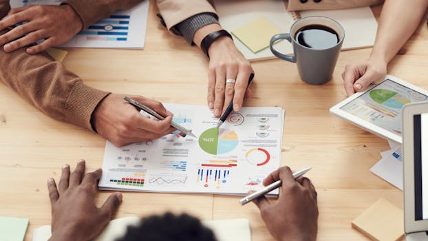 financial graphs and charts on a desk