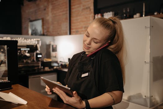 restaurant staff using tablets for orders