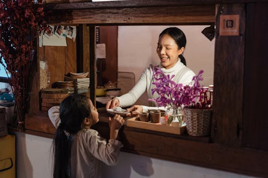 barista serving coffee to a customer