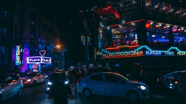 busy street with restaurant parking