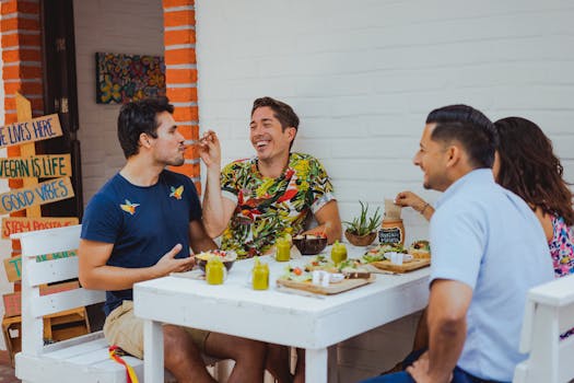 group of friends enjoying a meal at a restaurant